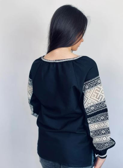 Hand-Embroidered Black Folk Cotton Blouse – White Puff Sleeve Boho Top with Tassel Best Product Description (copy-paste kar do):
