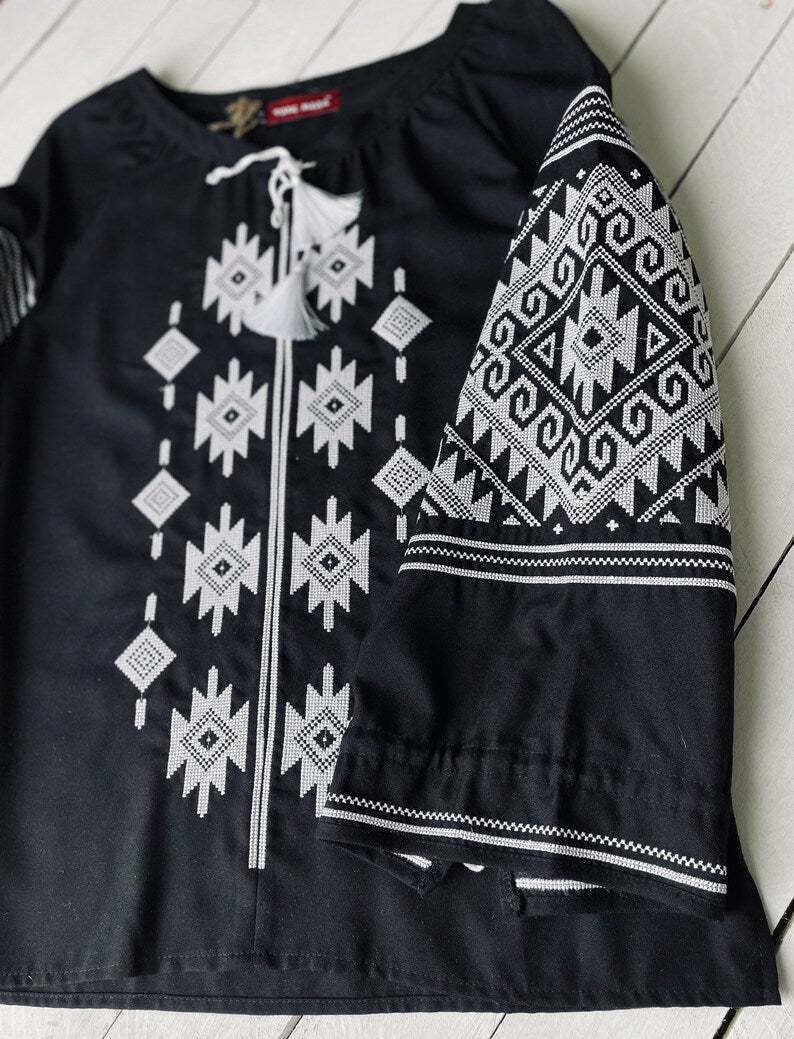 Hand-Embroidered Black Geometric Folk Cotton Blouse – Puff Sleeve Boho Top with Tassels